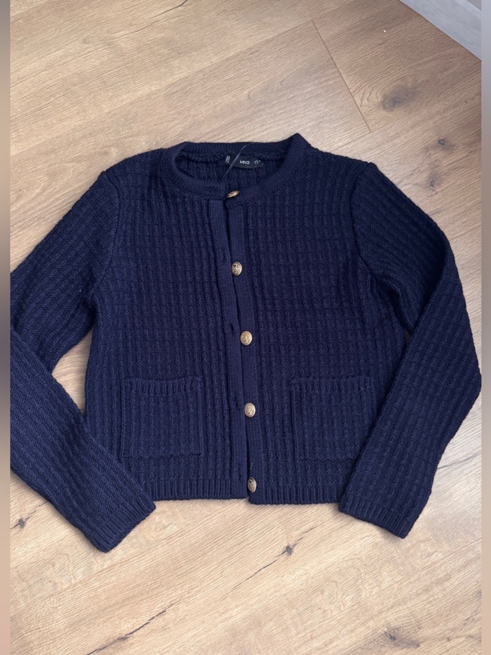 Navy Knit Button-Front Cardigan with gold furniture